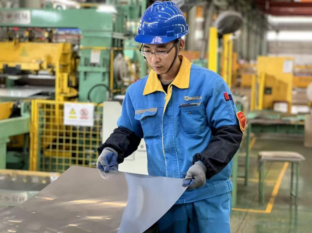 Ma Working on Steel Sheet Ma Working on Steel Sheet