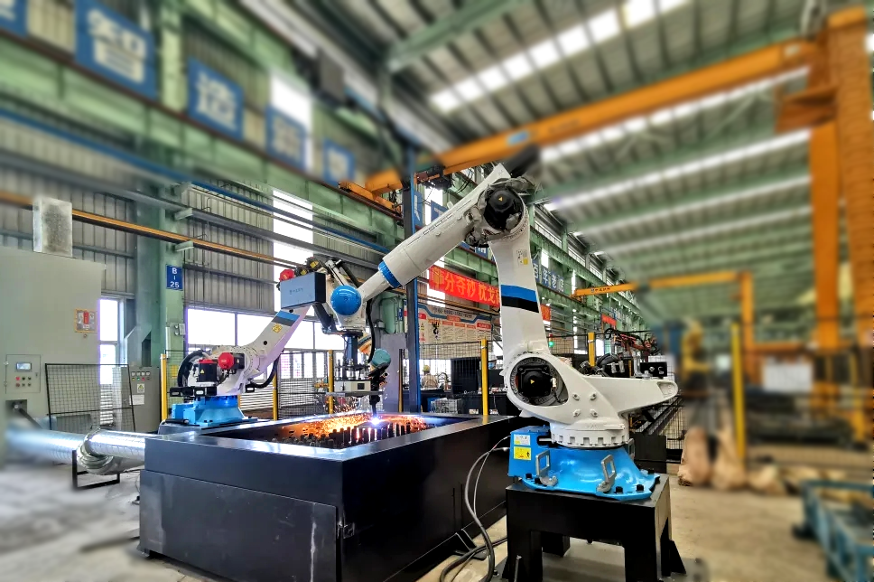 Intelligent Robotic Welding Workstation Intelligent Robotic Welding Workstation