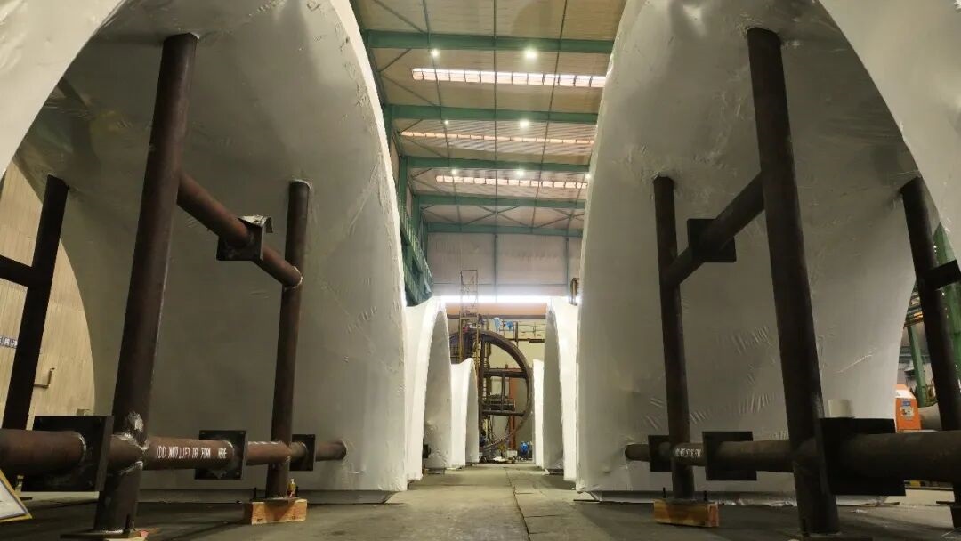 Grinding mill shells under fabrication inside workshop