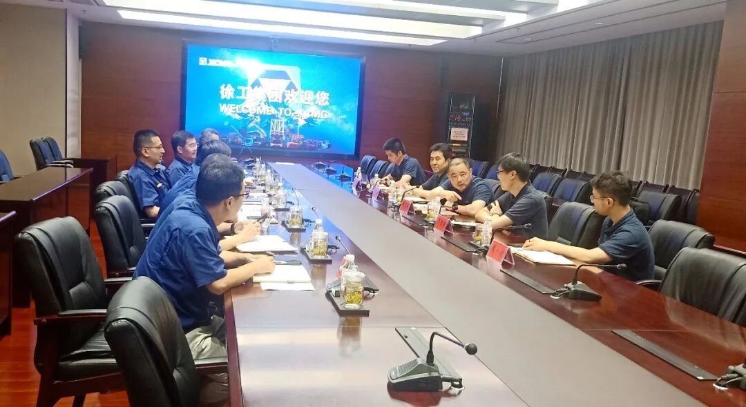 Executive teams from Daming International and XCMG Heavy discuss future cooperation opportunities