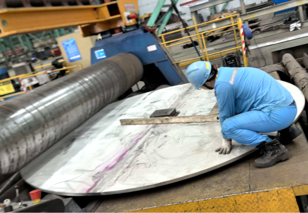 Precision leveling and forming of large scale 304 stainless steel plates for baffle plate fabrication