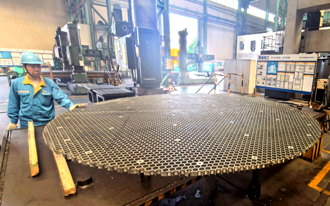 Precision machining of large scale 304 stainless steel baffle plates with over 9000 holes per plate