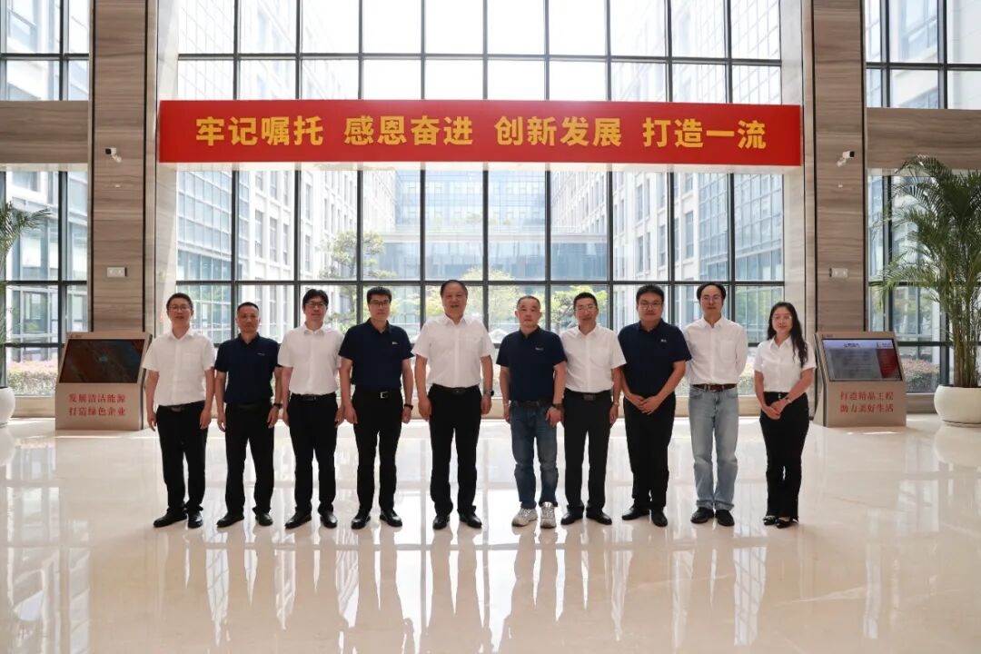 Representatives from both companies at the signing ceremony
